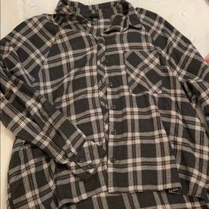 Plaid shirt with side pockets. Oversized fit
